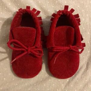 Red toddler soft sole shoes.